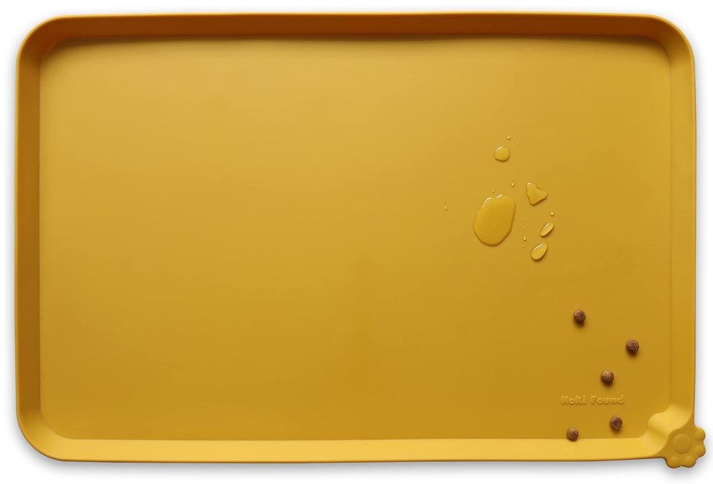 Hoki Found L silicone non-slip pet feeding mat overview shows spill containment and easy cleaning.