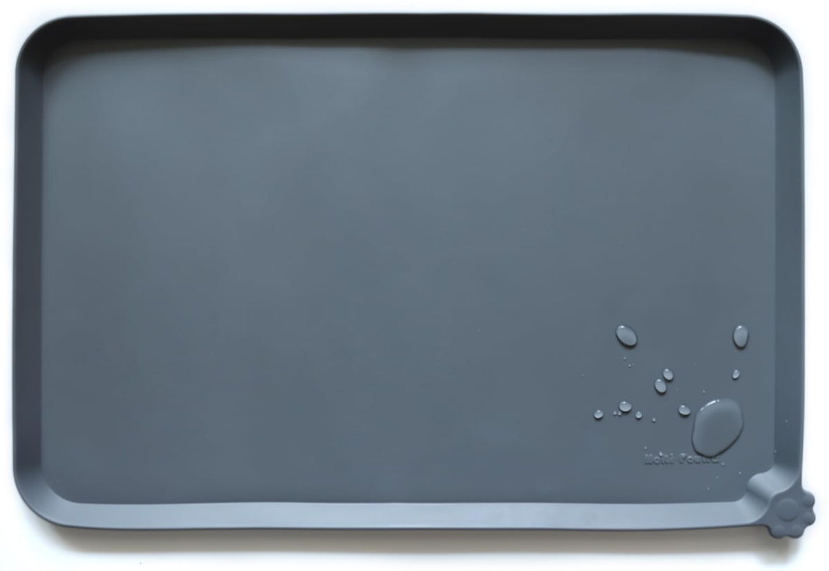 Hoki Found L silicone pet food mat in gray keeps floors clean during meals.