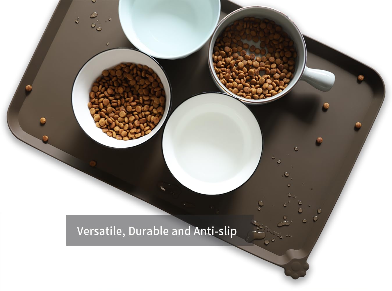 Hoki Found L silicone mat raised edge containing spills on carpeted floors.
