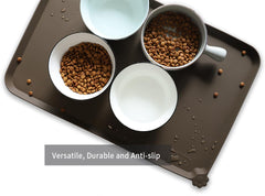 Hoki Found L silicone mat raised edge containing spills on carpeted floors.