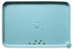 Hoki Found silicone non-slip mat closeup highlights raised edge for spill prevention