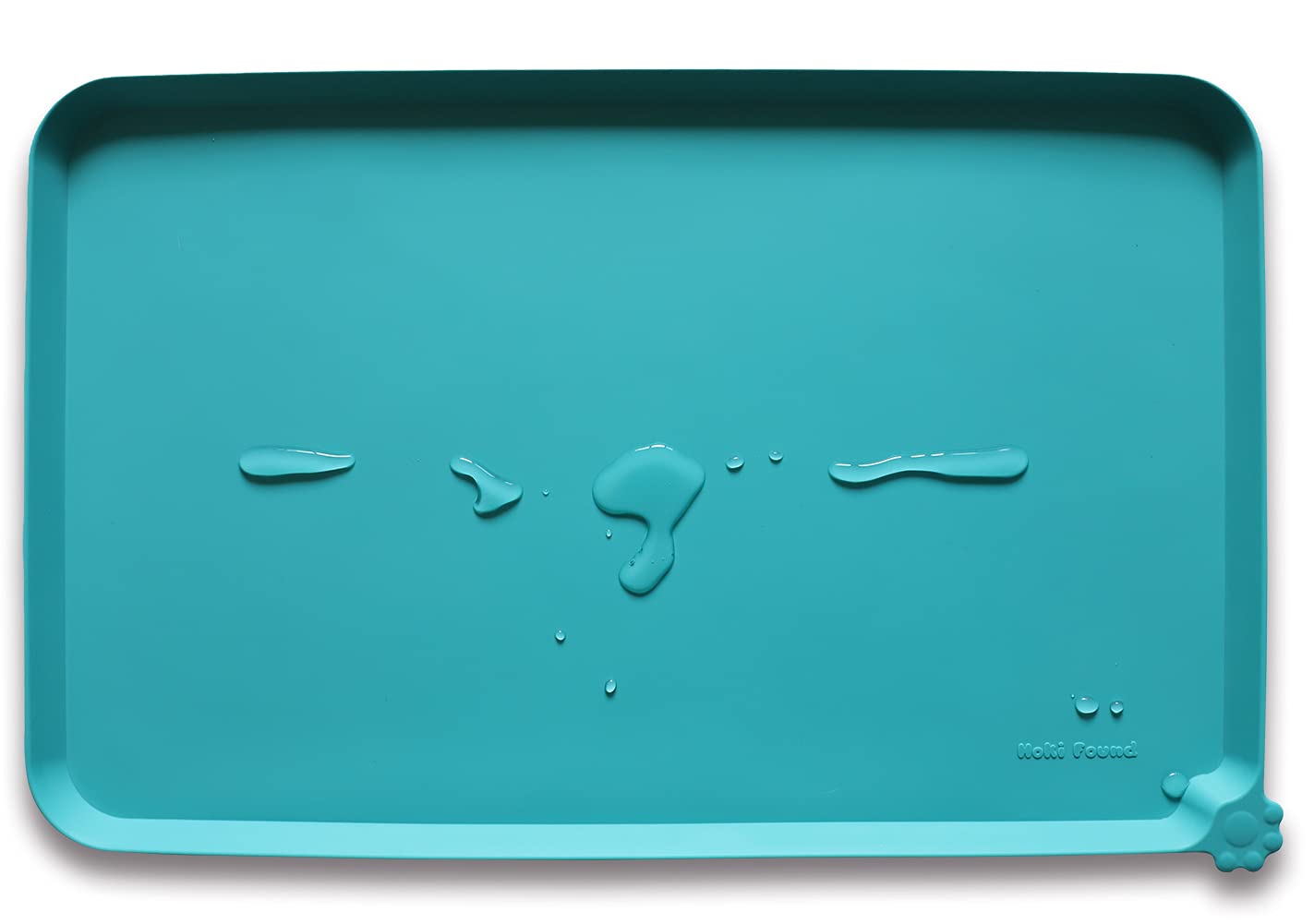 Hoki Found silicone non-slip pet feeding mat teal closeup shows easy-clean, spill-preventing surface.