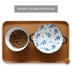 Hoki Found butterscotch-colored mat sized 19x12 inches for pet feeding