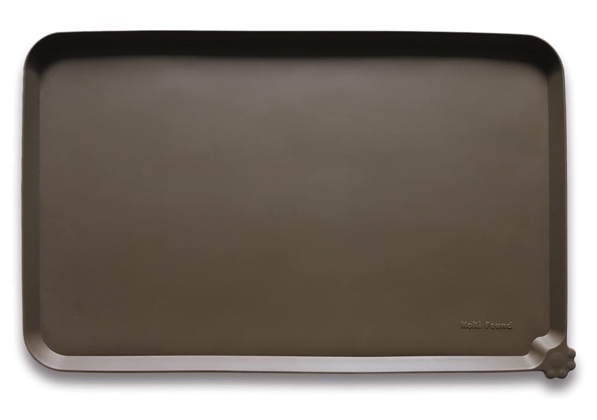 Hoki Found silicone pet food mat anti-slip surface keeps bowls in place during meals.