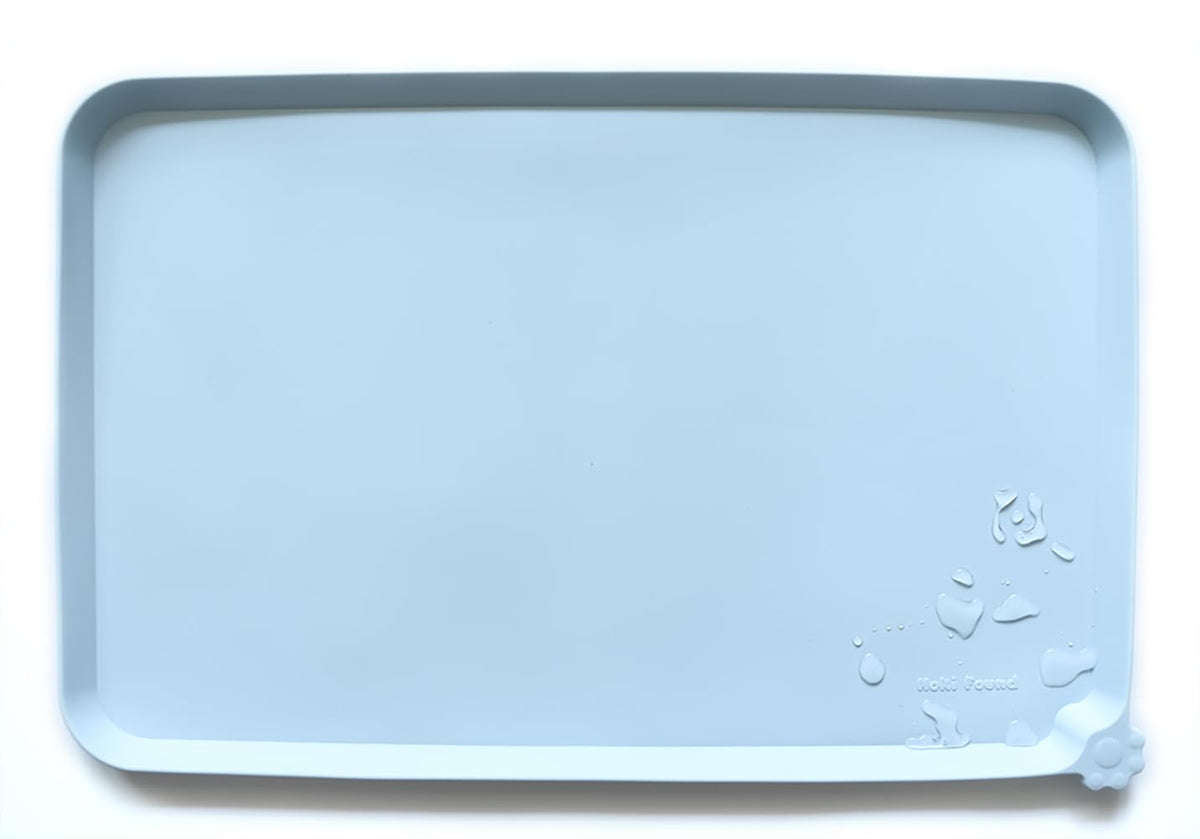 Hoki Found silicone pet food mat non-slip keeps bowls steady during meals.
