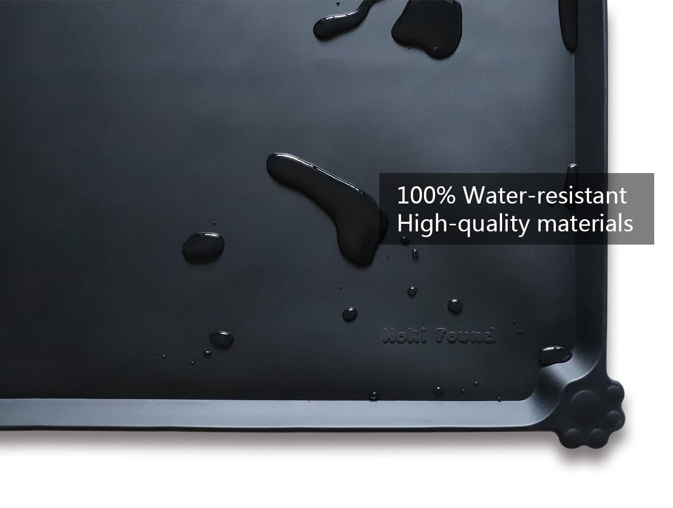 Hoki Found silicone mat features a raised edge to prevent spills.