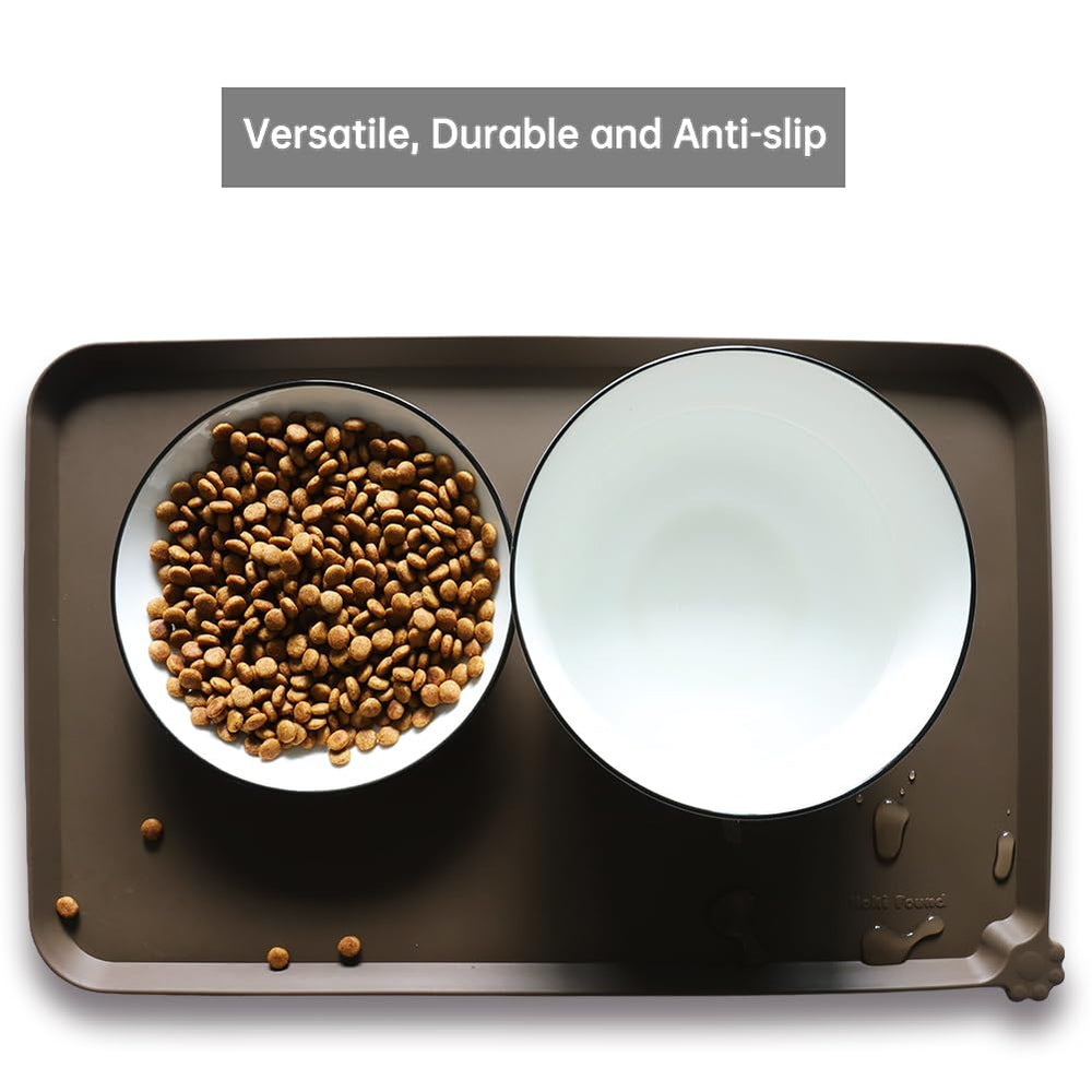 Hoki Found silicone mat features a raised edge to contain water and crumbs.