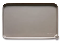 Hoki Found waterproof pet feeding mat with high lip protects floors during meals.