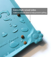 Hoki Found X-Large silicone non-slip pet feeding mat Glacier full view shows raised edge to prevent spills.