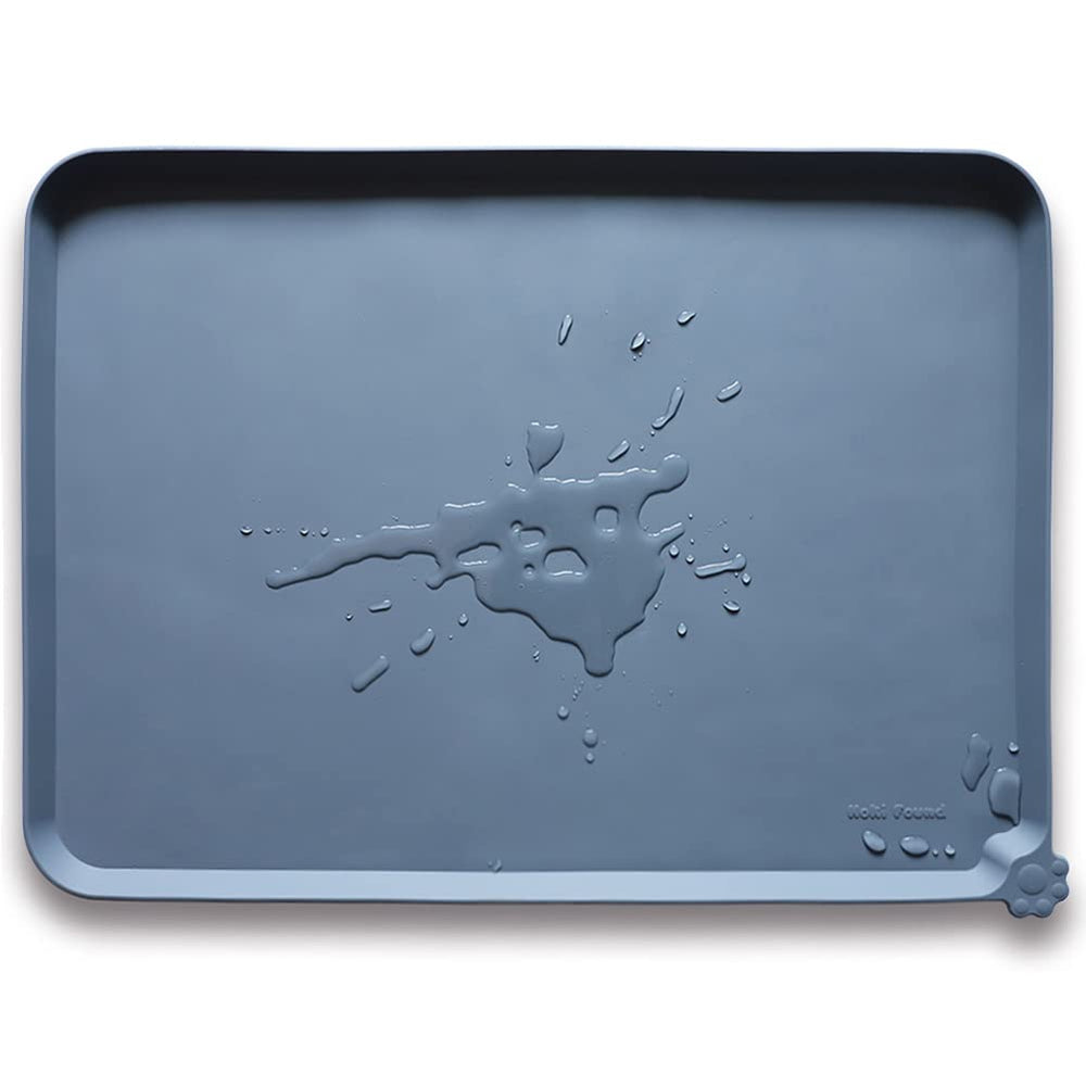 Hoki Found XX-Large silicone feeding mat in gray with raised edge to reduce spills.