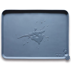 Hoki Found XX-Large silicone feeding mat in gray with raised edge to reduce spills.