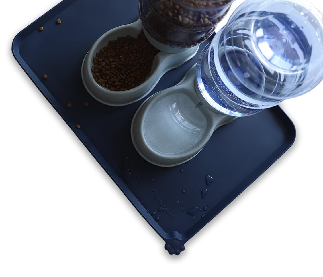 Hoki Found French Navy feeding mat on floor for tidy dining area