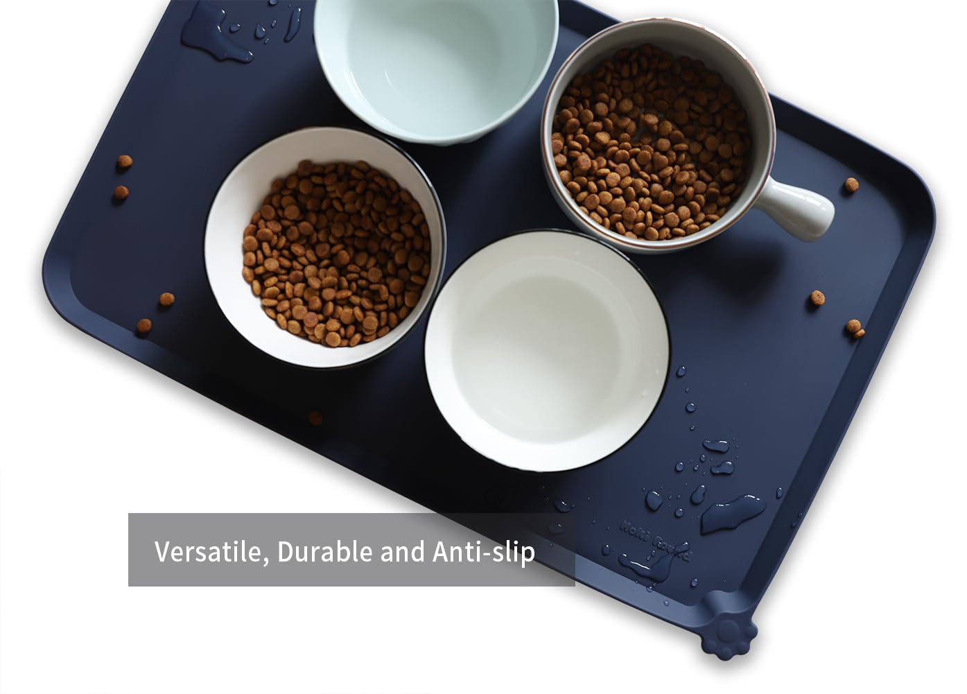Hoki Found L silicone non-slip pet bowl mat on carpet protects floors and surfaces.