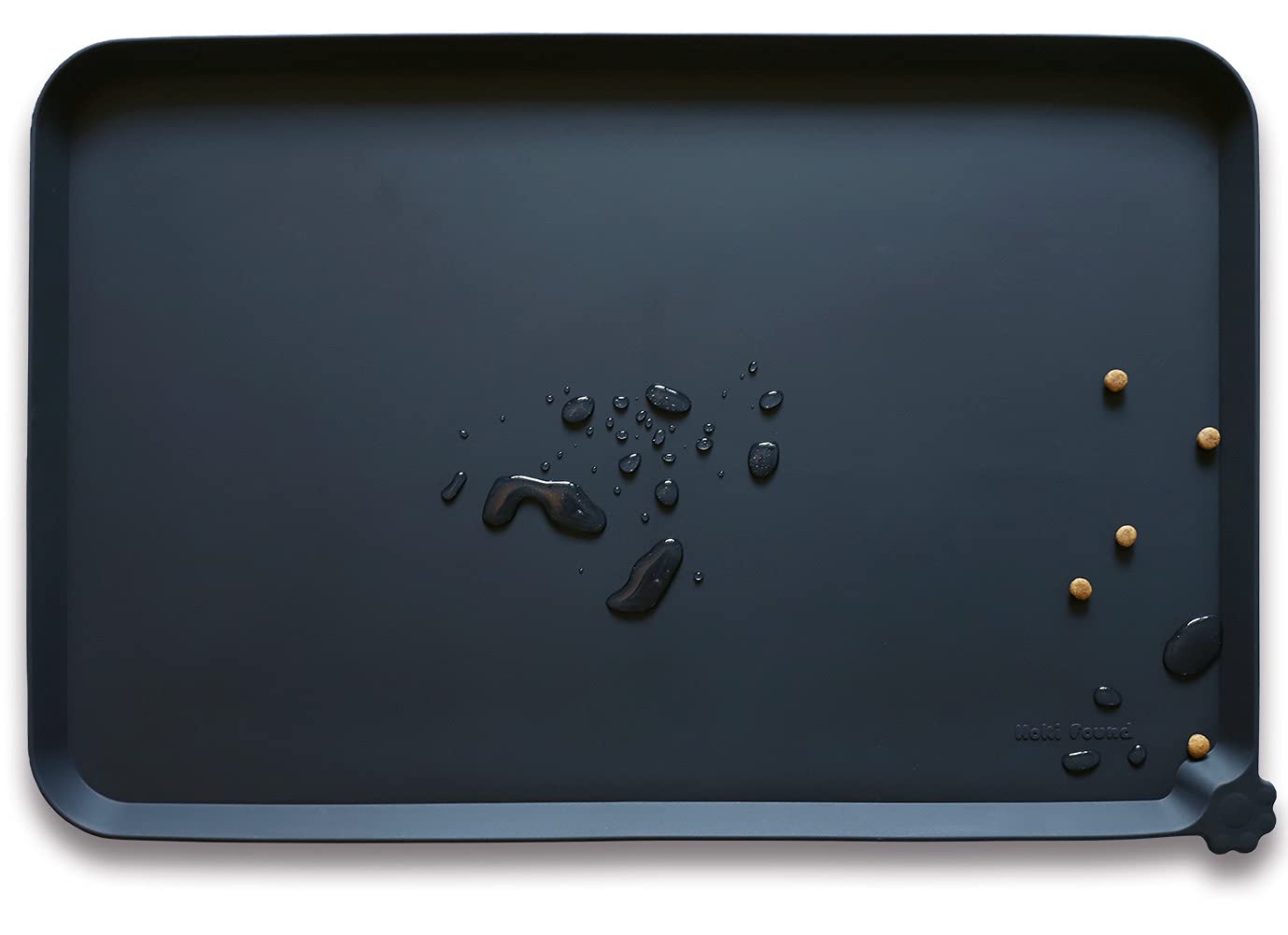 Hoki Found silicone pet food mat with non-slip surface keeps bowls steady and floors clean.