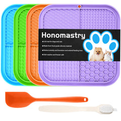 Honomastry lick mat on a surface helps calm dogs during meals and grooming.