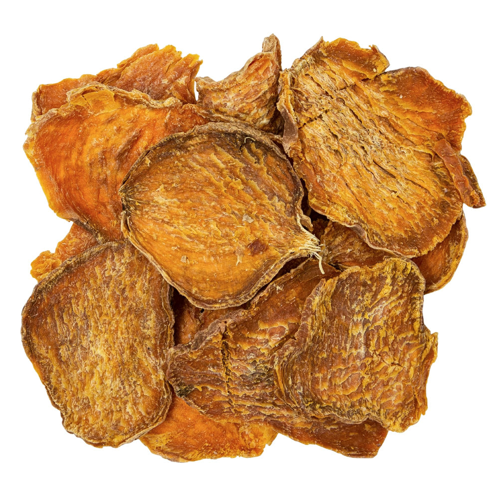 Hotspot Pets grain-free low-fat dog treats in hand for dietary-friendly option.