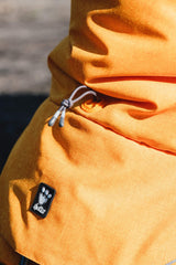 Hurtta Expedition Parka Bilberry reflective piping boosts visibility in low light