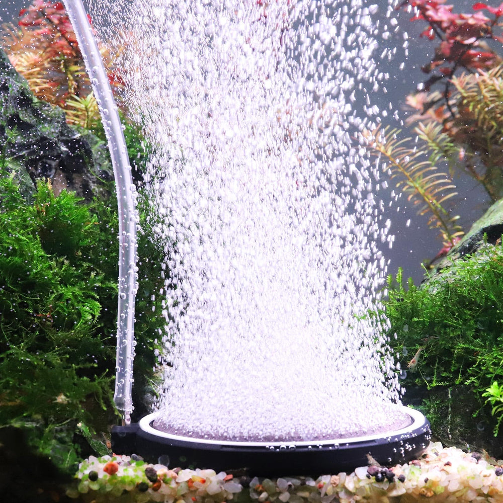 Hygger air stone disc 4x4 releases fine bubbles for steady oxygenation in aquariums.