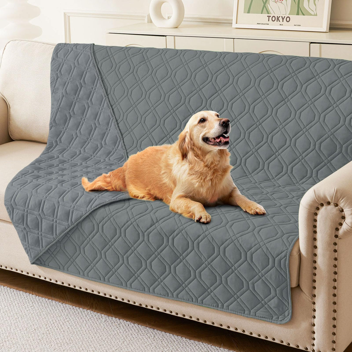 Hyha waterproof dog bed blanket in dark grey guards furniture with triple waterproof protection.