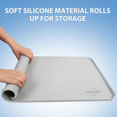 IMMCUTE high-edge holder contains leaks and protects floors during bathroom breaks.