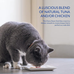 INABA Churu Bisque being served from a pouch into a cat bowl