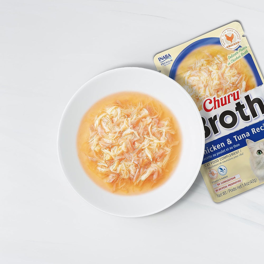 INABA Churu broth chicken-salmon pouch pairs shredded chicken with creamy broth for toppers.