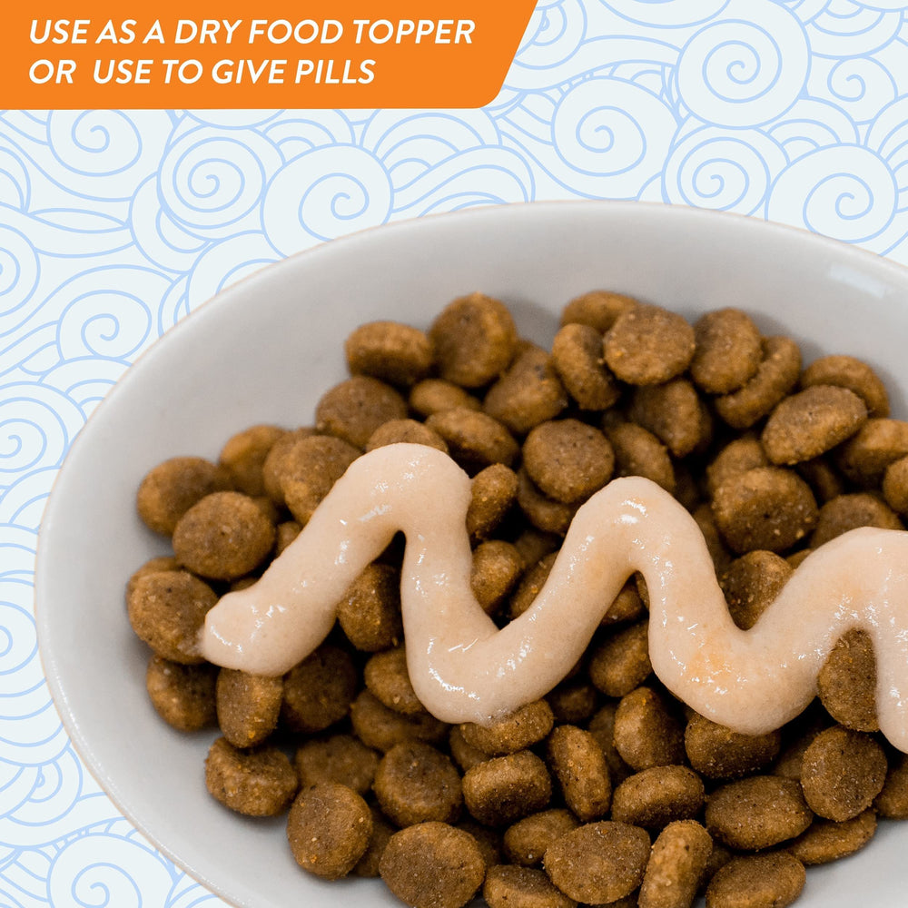 INABA Churu tube used as a tasty wet-dry topper for meals.