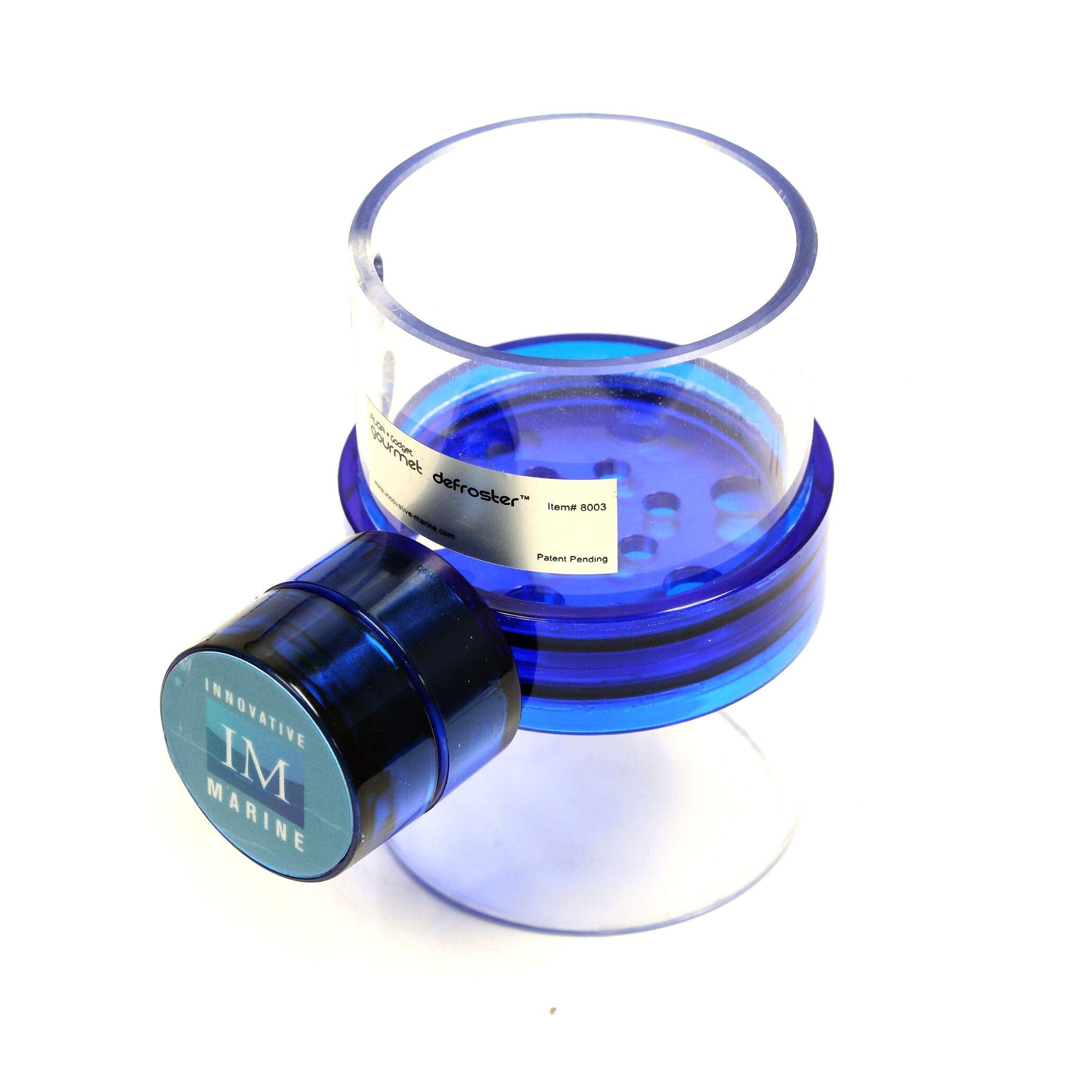 Innovative Marine Gourmet Gadget Defroster PRO feeder demonstrates precise portioning for frozen foods.