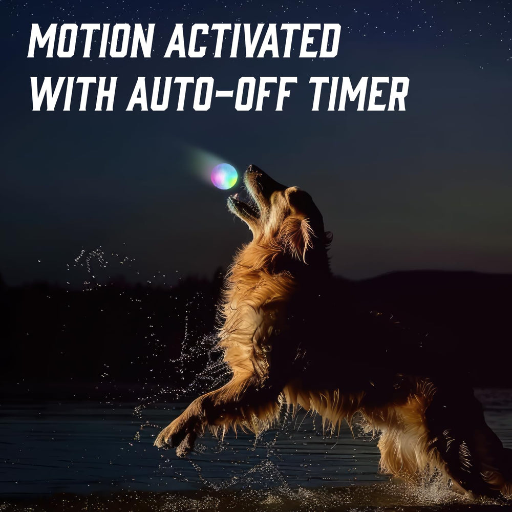Iron Paws colour-changing LED ball glowing at dusk for engaging play