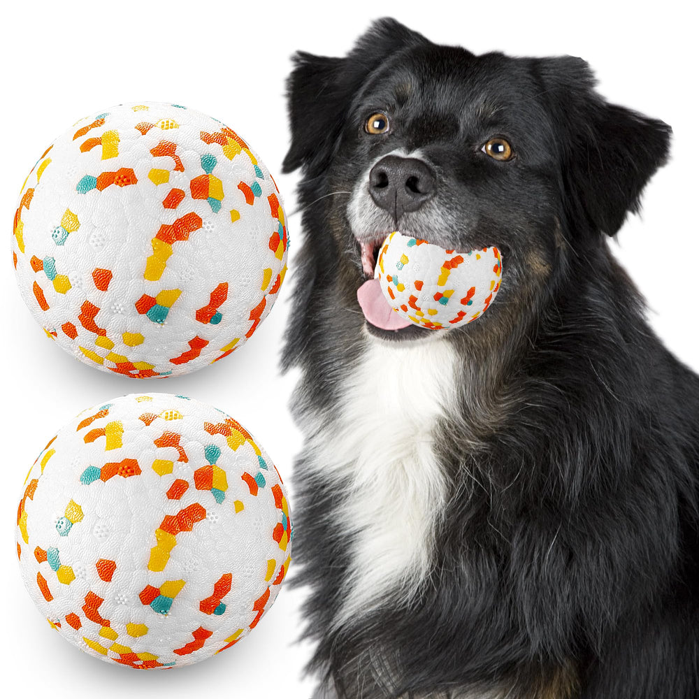 JEROCK dog ball in action shows bite-resistant durability for aggressive chewers.