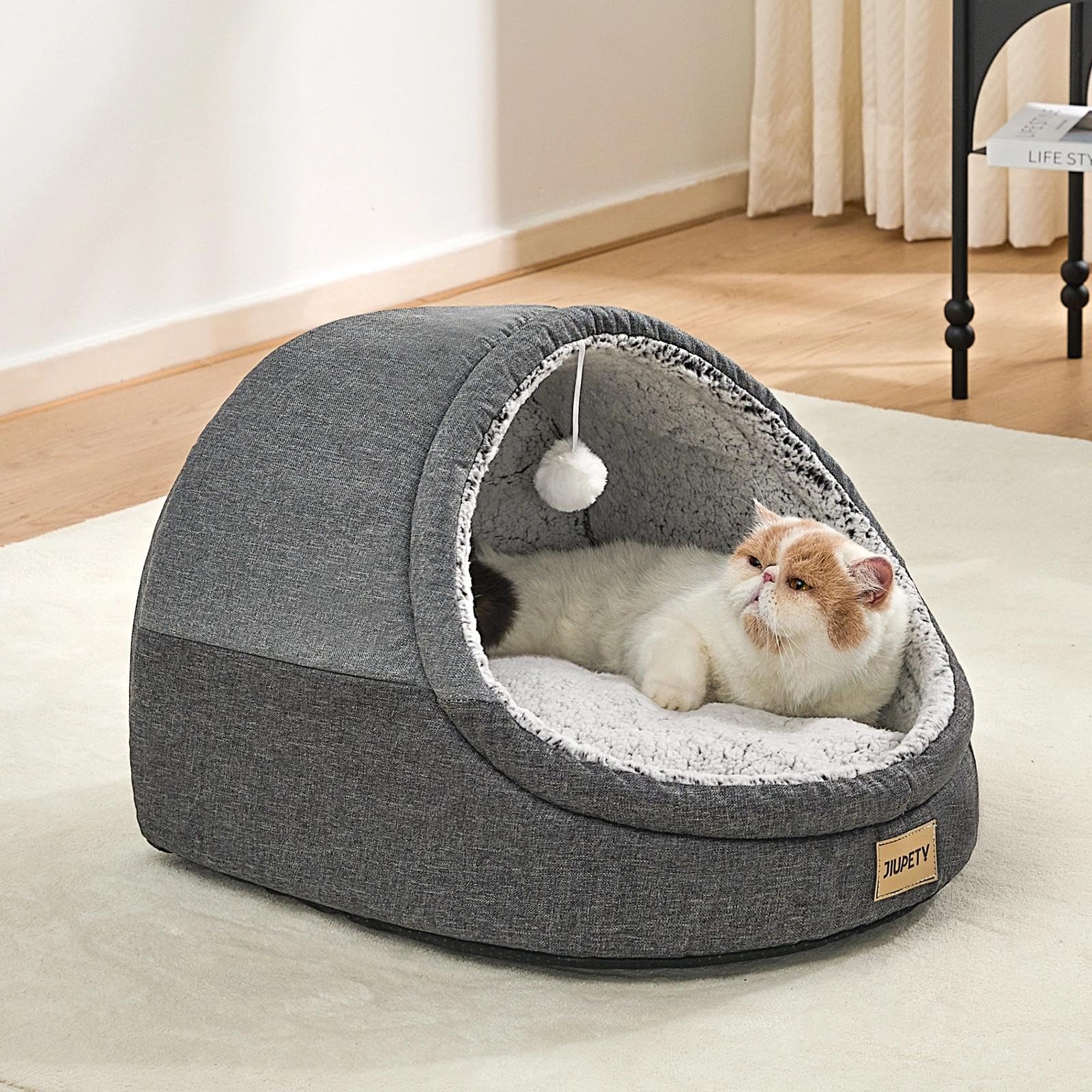 Jiupety cat bed vacuum-sealed package expands to full shape after opening.