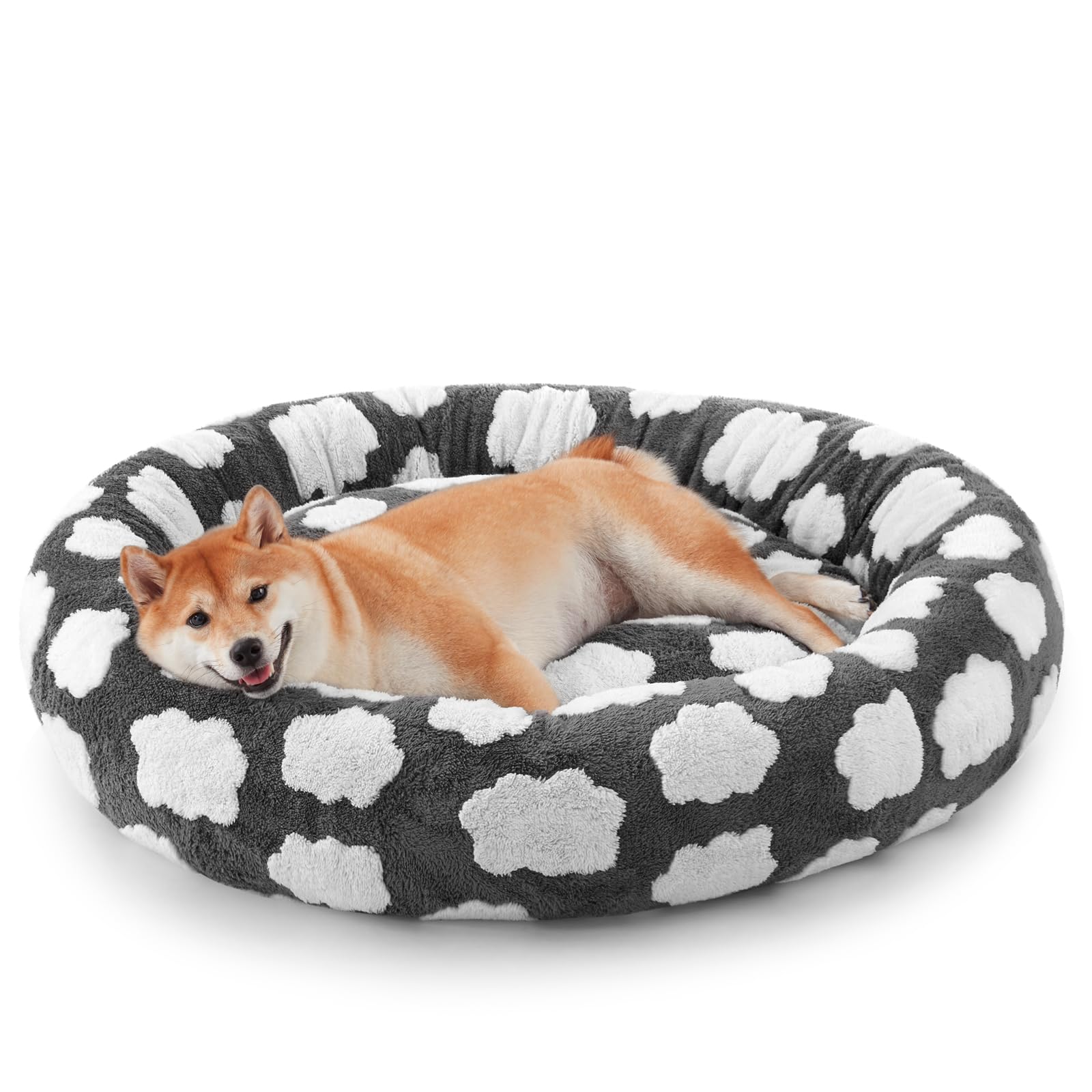 JOEJOY Donut Bed sits in a cozy living room, inviting pets to curl up for warmth.