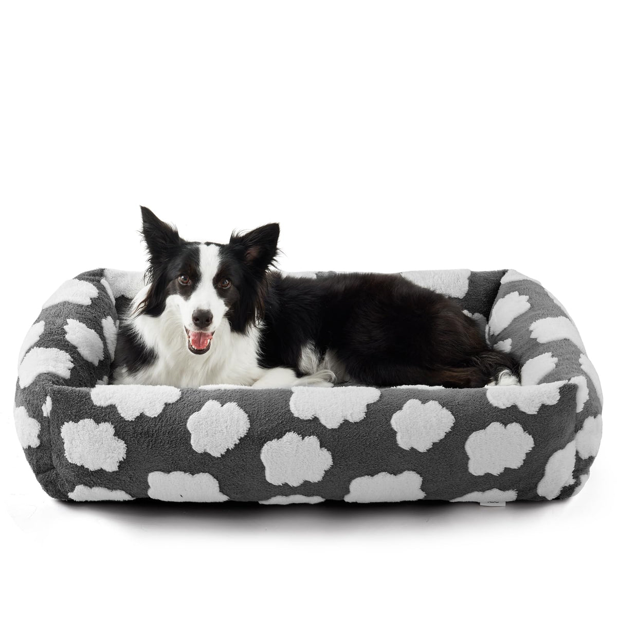 JOEJOY raised-sides dog bed provides secure head support for restful naps.