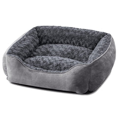 JOEJOY rectangle dog bed with soft faux fur provides luxurious warmth for cozy naps.