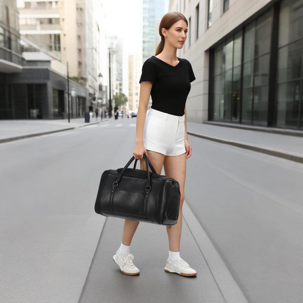 Johomviin black pet carrier close-up shows a sleek, modern finish.
