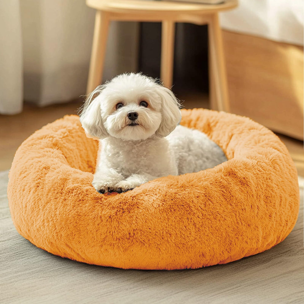 JOLLYVOGUE dog-cat-bed-donut-outer-closeup shows plush faux fur for calming warmth and security.