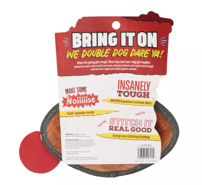 Joyhound Rip Roarin' football dog toy in action demonstrates durable play for aggressive chewers.