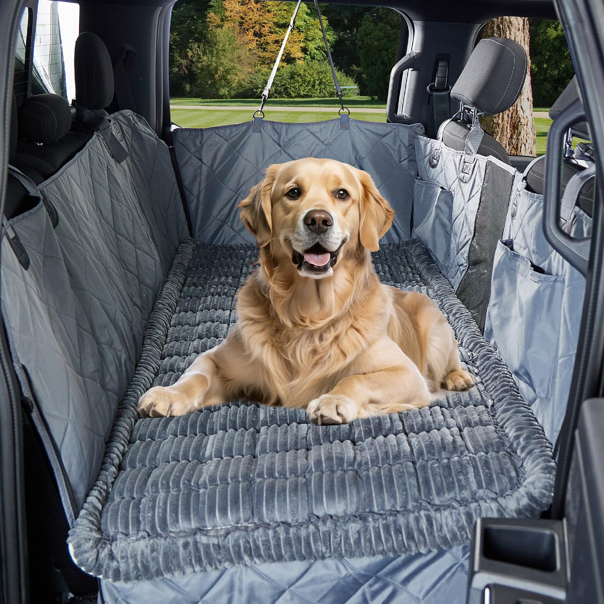 JOYTUTUS dog mat bed on a backseat extender offering a cozy, secure ride for pets