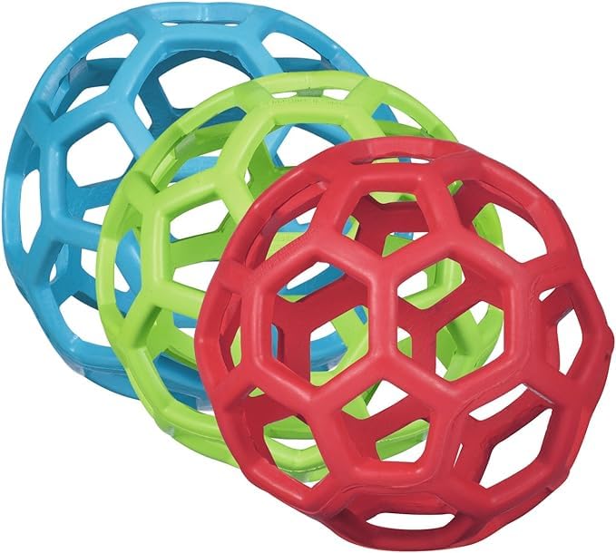 JW Pet HOLEE Roller Ball in assorted colors ideal for backyard fetch.