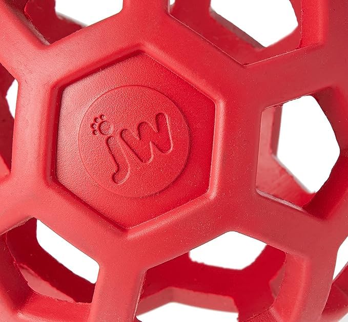 JW Pet HOLEE Roller Ball honeycomb holes ready for treat stuffing and puzzle play.