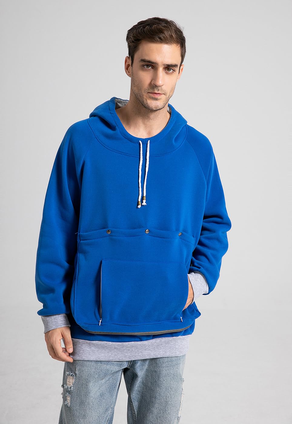 Kei Tomlison pouch hoodie fleece texture suggests soft warm comfort