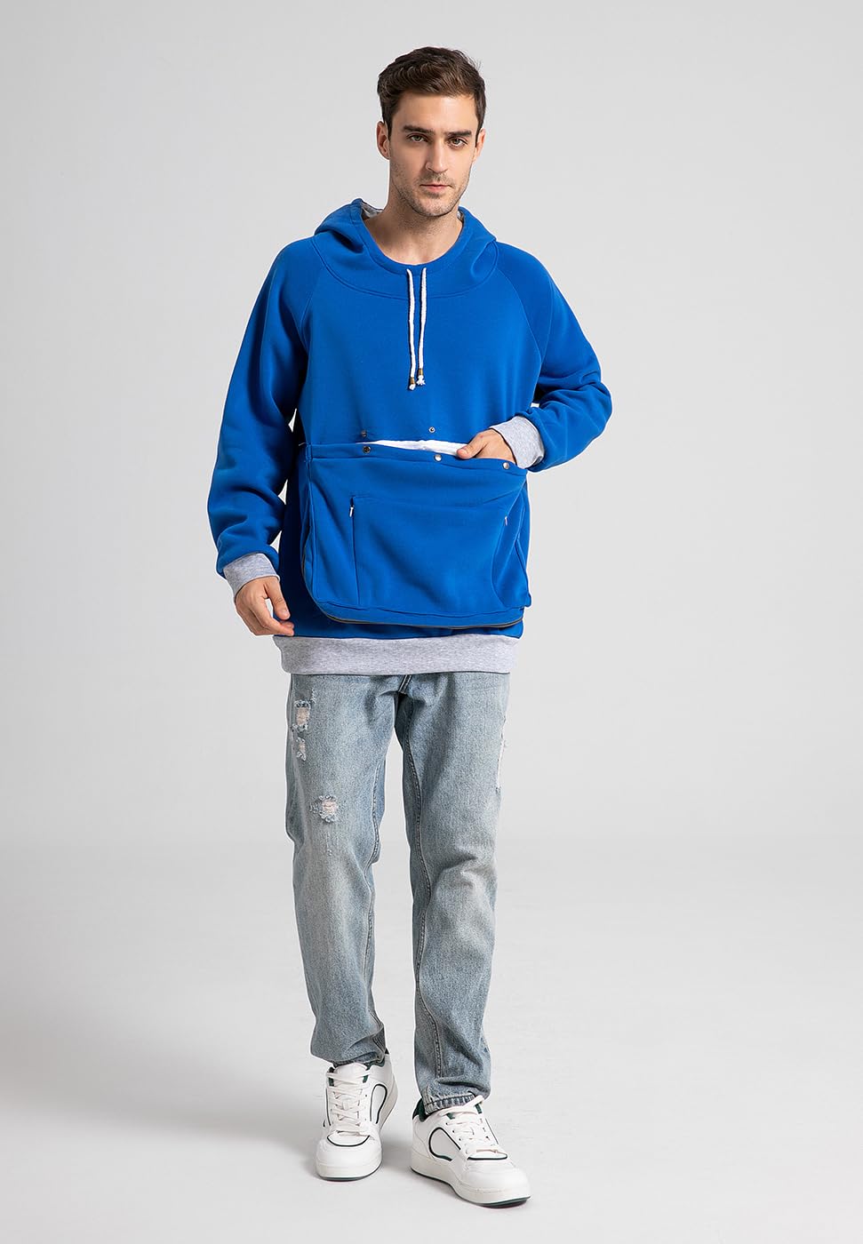 Kei Tomlison pouch hoodie model wearing for cozy casual warmth