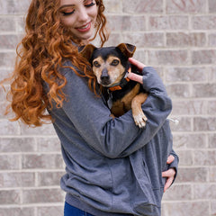 Kei Tomlison hoodie pocket-inside view—ample space for essentials or tiny furry friends.