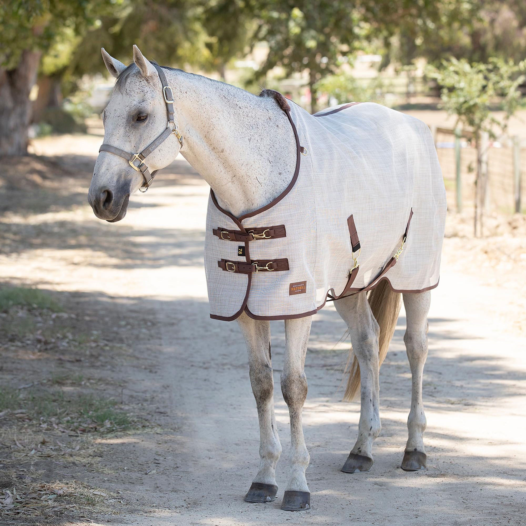 Kensington Protective Sheet belly straps close-up highlighting 2-inch adjustability.