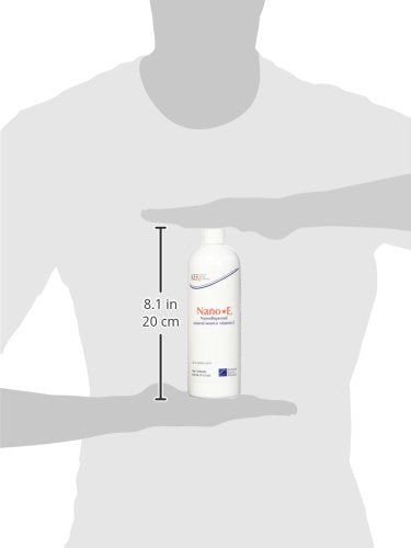 Horse in field with Nano-E bottle illustrates potential muscle and reproductive support.