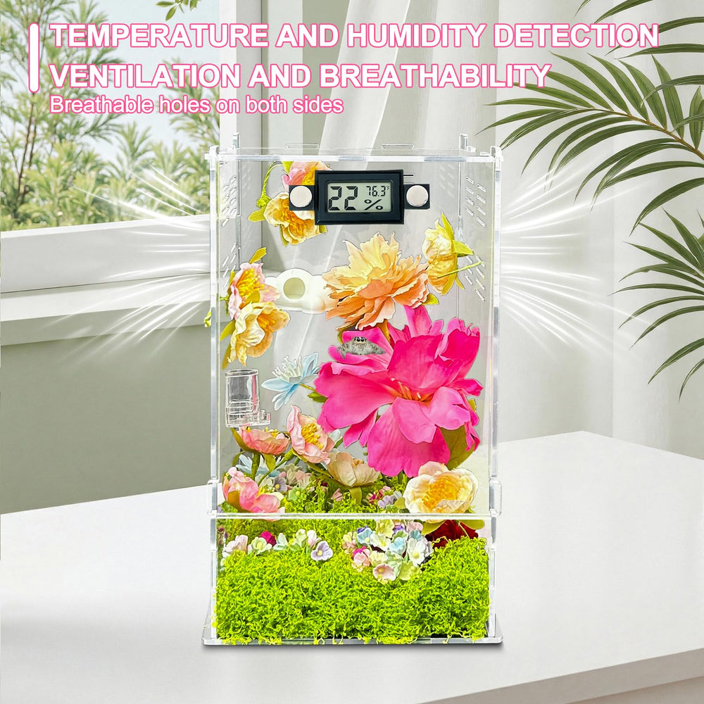 KFPSHLQE artificial flowers and moss décor decorate enclosure, adding natural hiding spots.