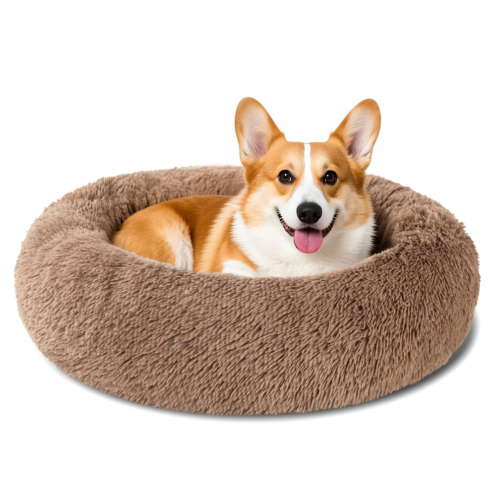Kimpets round donut dog bed in khaki offers cozy comfort for dogs of all sizes.