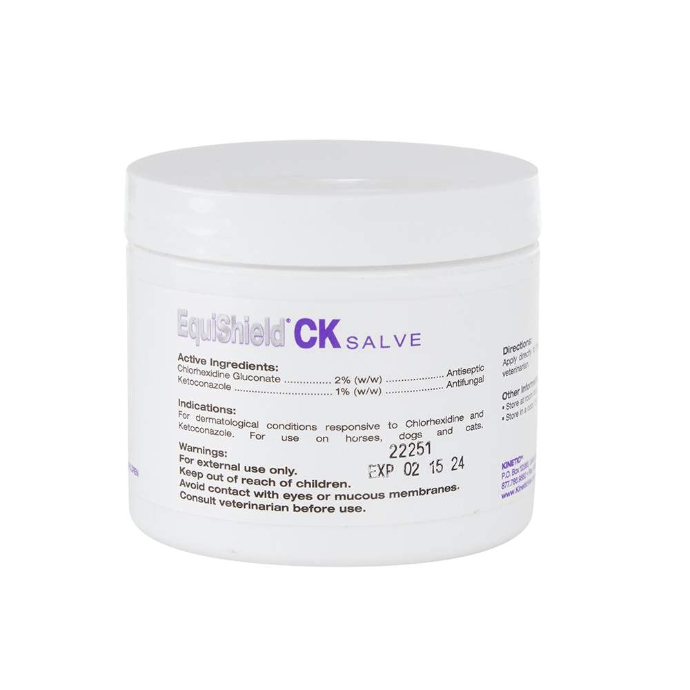 Kinetic Vet EquiShield CK Salve application—hand applying to horse's pastern after ride for comfort.