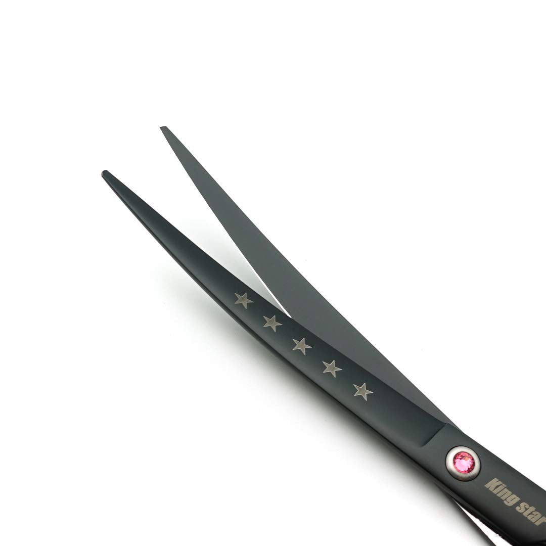 Kingstar 8in scissors in hand showing ergonomic grip for extended grooming.