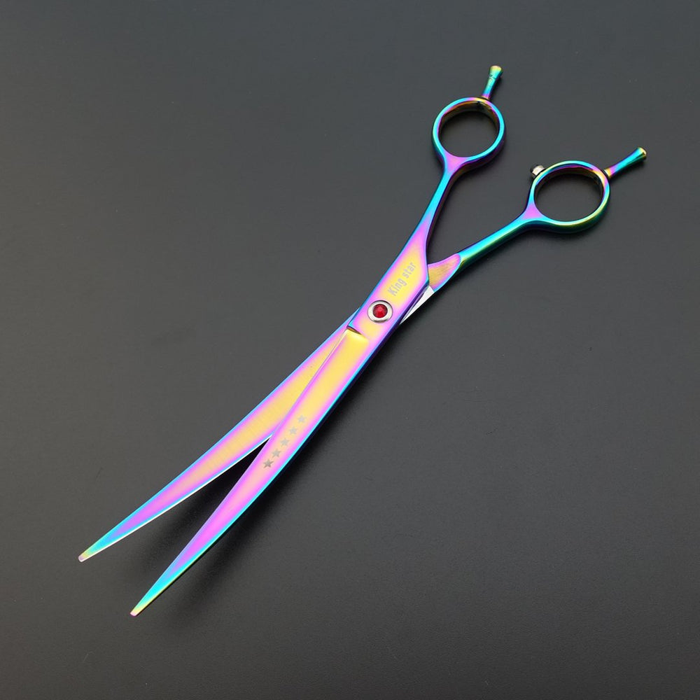KINGSTAR professional groomer using scissors for pet grooming.